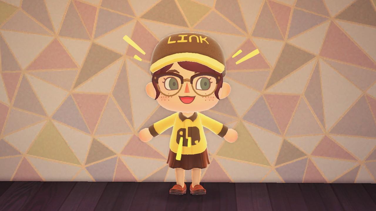 Miss Link wearing a yellow Link uniform and cap inside Animal Crossing